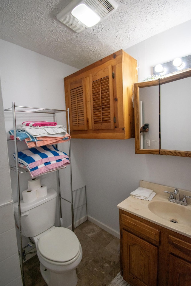 108 Central Ct, Richmond, KY 40475 - bathroom featuring toilet, a textured ceiling, and vanity