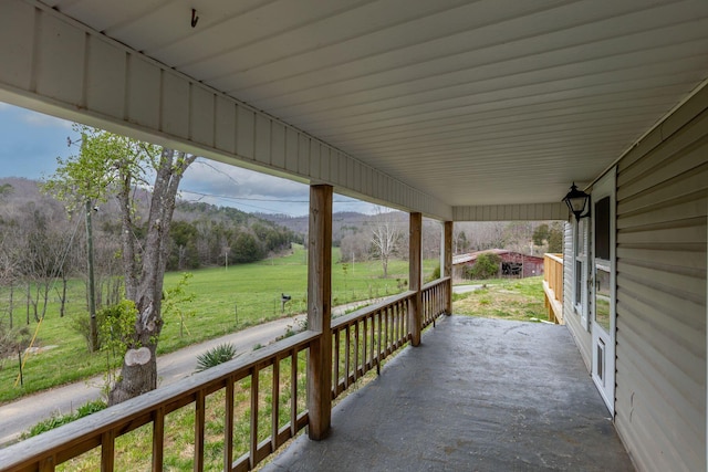 exterior space with a lawn and covered porch