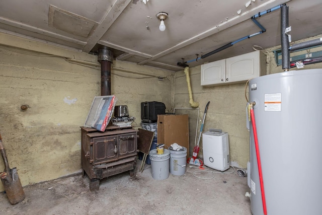 unfinished basement featuring water heater