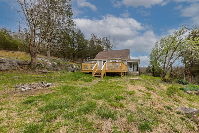 rear view of house with a deck