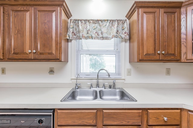 122 Barker Way, Lancaster, KY 40444 - kitchen featuring a sink, dishwasher, light countertops, and brown cabinets