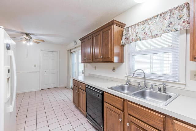 122 Barker Way, Lancaster, KY 40444 - kitchen featuring black dishwasher, white fridge with ice dispenser, a sink, light tile patterned flooring, and light countertops