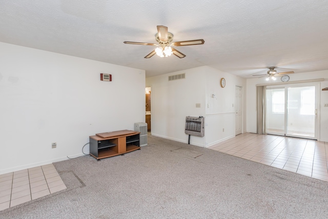 122 Barker Way, Lancaster, KY 40444 - unfurnished living room with ceiling fan, tile patterned flooring, carpet, heating unit, and baseboards