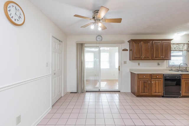 122 Barker Way, Lancaster, KY 40444 - kitchen with dishwasher, a ceiling fan, a sink, light countertops, and plenty of natural light