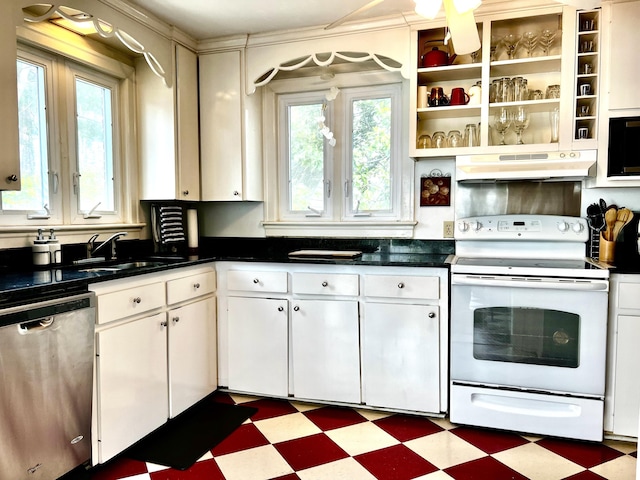 847 W Lexington Ave, Danville, KY 40422 - kitchen with white range with electric cooktop, tile patterned floors, stainless steel dishwasher, and under cabinet range hood