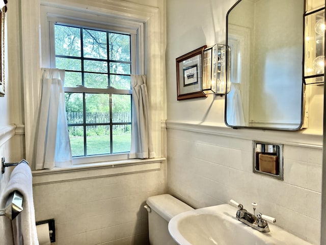 847 W Lexington Ave, Danville, KY 40422 - half bathroom featuring tile walls, toilet, and a sink