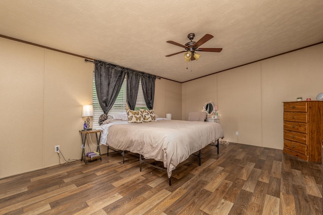 1132 State Highway 1662, Olive Hill, KY 41164 - bedroom with a ceiling fan, a decorative wall, a textured ceiling, and wood finished floors