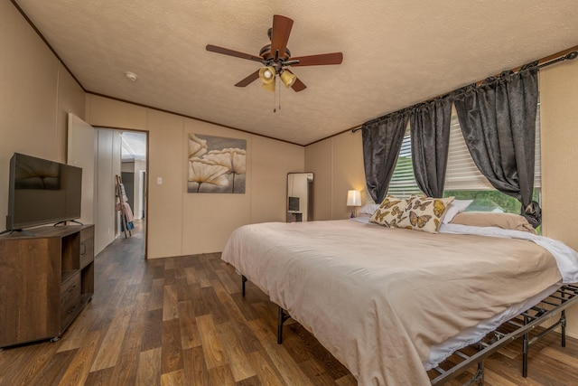 1132 State Highway 1662, Olive Hill, KY 41164 - bedroom with dark wood-style flooring, a textured ceiling, crown molding, and a ceiling fan