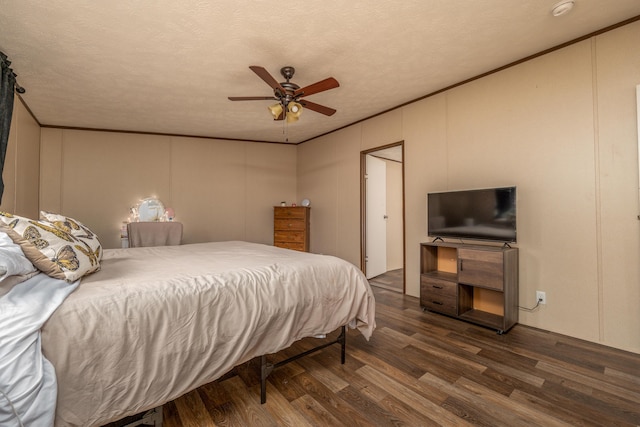 1132 State Highway 1662, Olive Hill, KY 41164 - bedroom featuring ornamental molding, a decorative wall, a ceiling fan, and wood finished floors