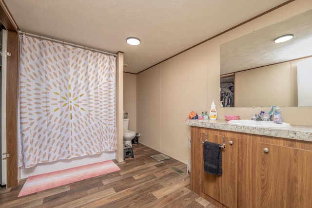 1132 State Highway 1662, Olive Hill, KY 41164 - bathroom featuring toilet, wood finished floors, and vanity
