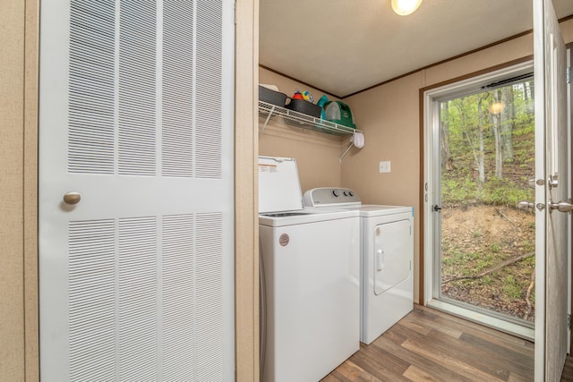 1132 State Highway 1662, Olive Hill, KY 41164 - laundry room featuring a heating unit, laundry area, wood finished floors, and washing machine and clothes dryer