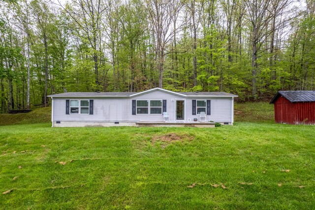 1132 State Highway 1662, Olive Hill, KY 41164 - manufactured / mobile home featuring a storage unit, an outdoor structure, a front lawn, and crawl space