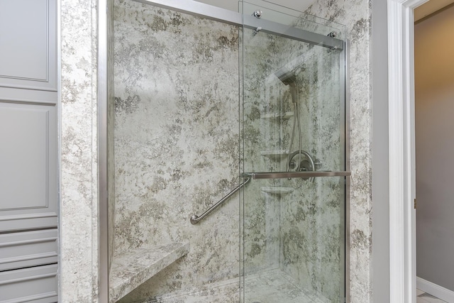 bathroom with a stall shower