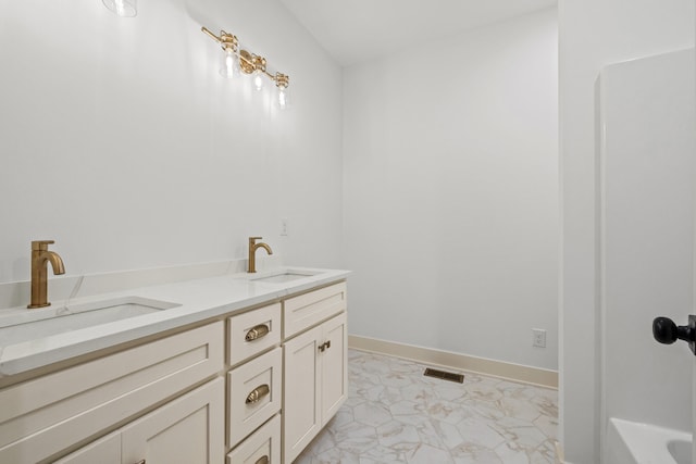 35 Valley Pointe Dr, Somerset, KY 42501 - full bathroom featuring double vanity, visible vents, a bathtub, and a sink
