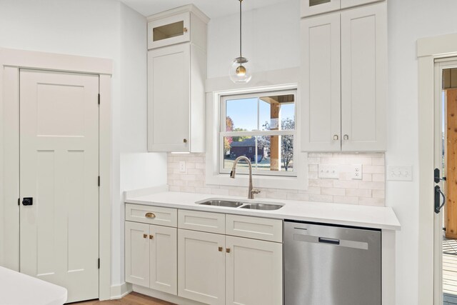 35 Valley Pointe Dr, Somerset, KY 42501 - kitchen featuring a sink, dishwasher, decorative backsplash, and light countertops
