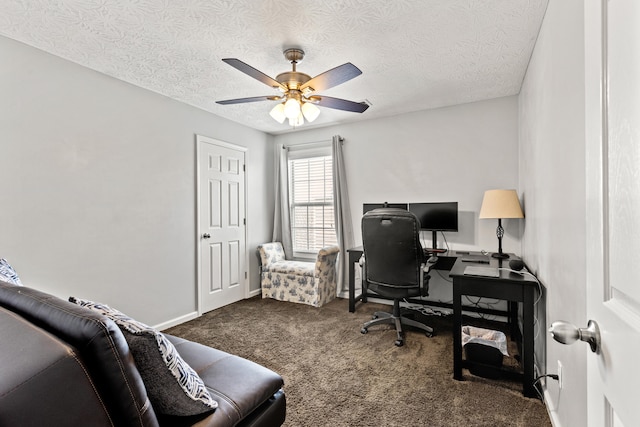 home office featuring baseboards, a ceiling fan, a textured ceiling, and carpet flooring