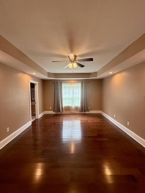 301 Lattern Way, Frenchburg, KY 40322 - spare room featuring recessed lighting, a raised ceiling, a ceiling fan, baseboards, and dark wood finished floors