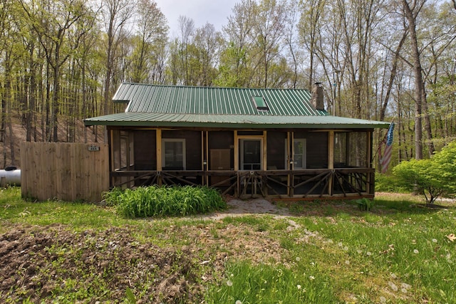 494 Deer Run Rd, Wellington, KY 40387 - back of property featuring a chimney, a sunroom, and metal roof