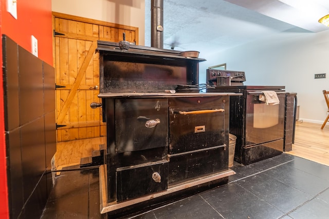 room details with black range with electric cooktop