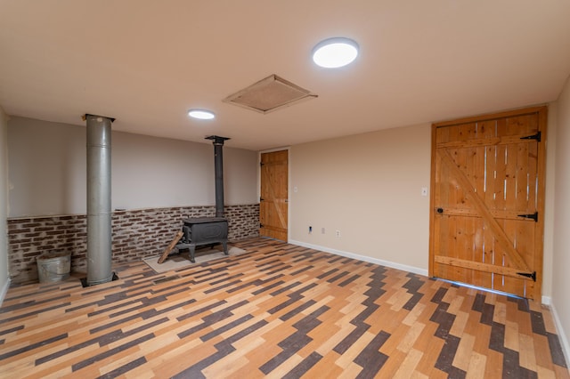 below grade area featuring a wood stove