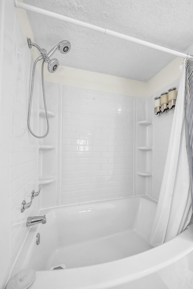 293 Deer Run Rd, Wellington, KY 40387 - full bath with shower / bath combo with shower curtain and a textured ceiling