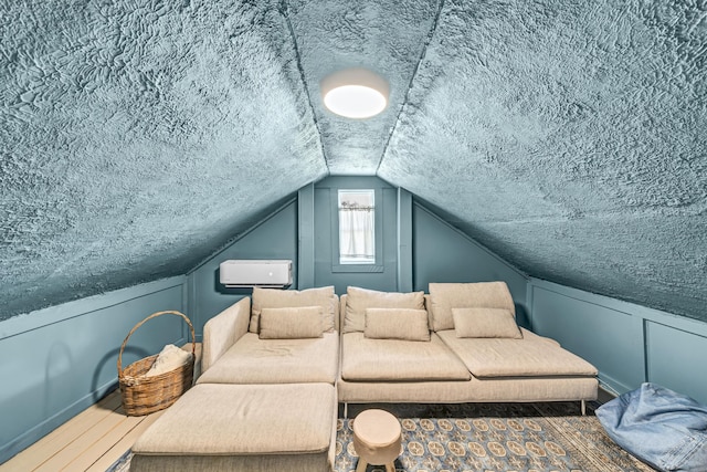 293 Deer Run Rd, Wellington, KY 40387 - home theater featuring lofted ceiling and a textured ceiling