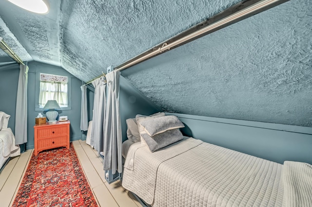 293 Deer Run Rd, Wellington, KY 40387 - bedroom featuring lofted ceiling and a textured ceiling