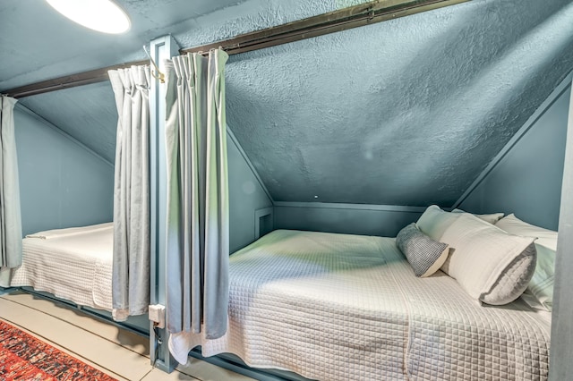 293 Deer Run Rd, Wellington, KY 40387 - bedroom featuring vaulted ceiling and a textured ceiling