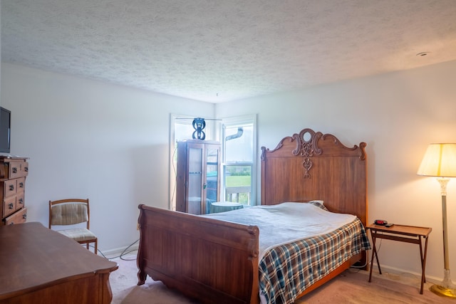 138 Hackett Pike, Richmond, KY 40475 - bedroom featuring a textured ceiling and baseboards