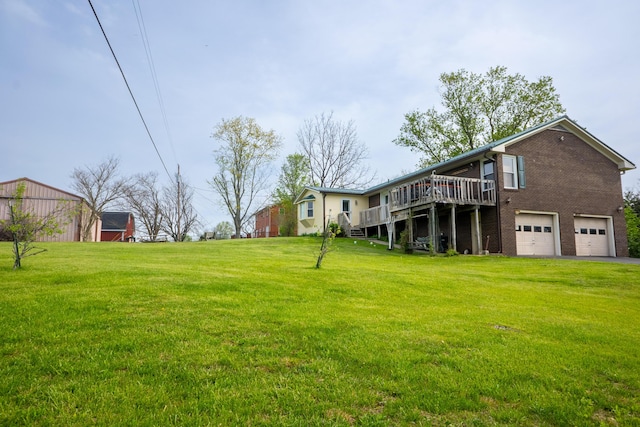 138 Hackett Pike, Richmond, KY 40475 - view of yard featuring driveway, an attached garage, and a wooden deck