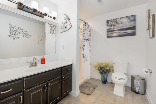 bathroom with a shower with curtain, vanity, toilet, baseboards, and tile patterned flooring