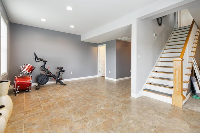 workout area featuring baseboards, recessed lighting, a wealth of natural light, and light tile patterned flooring