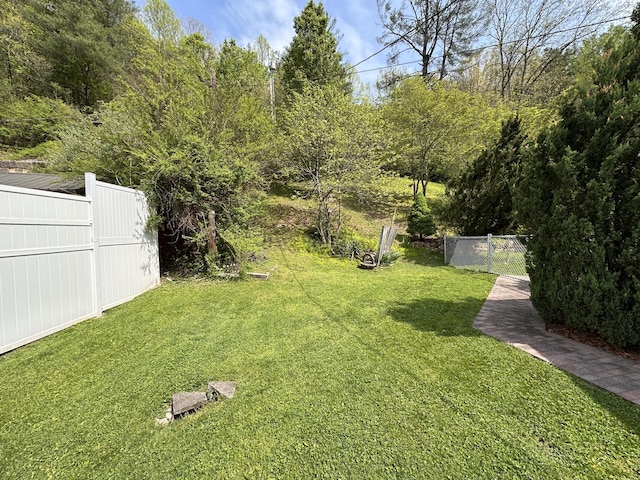 view of yard featuring fence
