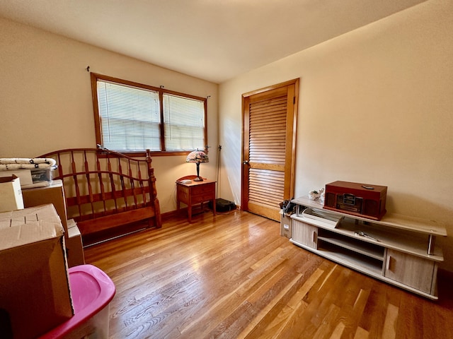 bedroom featuring wood finished floors