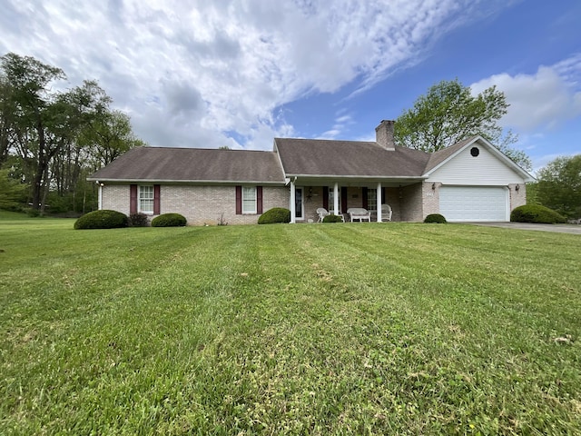 ranch-style home featuring covered porch, a chimney, brick siding, and a garage