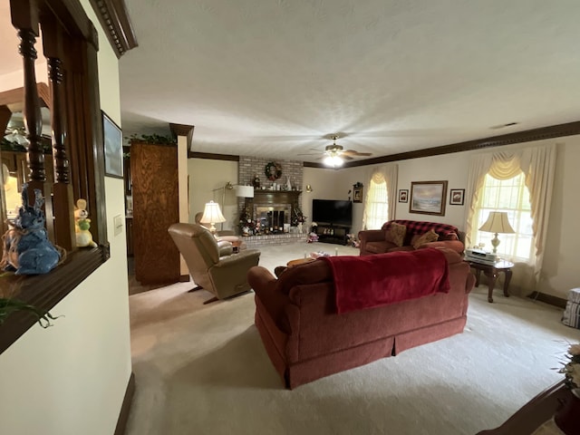 living room with light carpet, ceiling fan, and crown molding