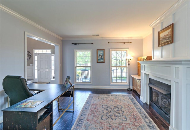 home office featuring ornamental molding, dark wood finished floors, and visible vents