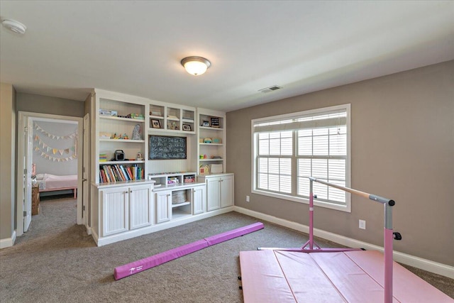recreation room with visible vents, carpet, and baseboards