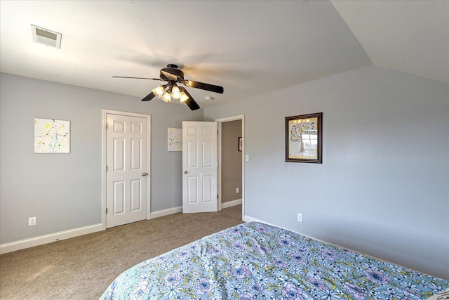 carpeted bedroom with baseboards, visible vents, and ceiling fan