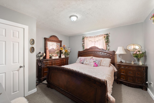 3576 Elkhorn Rd, Campbellsville, KY 42718 - carpeted bedroom with baseboards and a textured ceiling