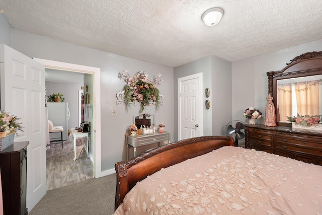 3576 Elkhorn Rd, Campbellsville, KY 42718 - bedroom with baseboards, carpet flooring, and a textured ceiling
