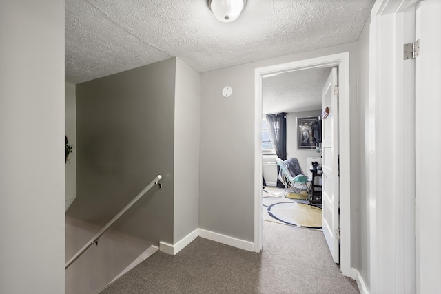 3576 Elkhorn Rd, Campbellsville, KY 42718 - hall with a textured ceiling, an upstairs landing, baseboards, and carpet