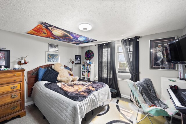 3576 Elkhorn Rd, Campbellsville, KY 42718 - bedroom featuring a textured ceiling, baseboards, and carpet