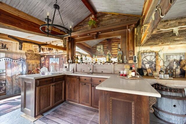 3576 Elkhorn Rd, Campbellsville, KY 42718 - kitchen featuring light countertops, light wood finished floors, a peninsula, and lofted ceiling