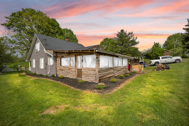 3576 Elkhorn Rd, Campbellsville, KY 42718 - exterior space featuring a chimney, a yard, stone siding, and metal roof