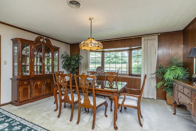 1964 Shadybrook Ln, Lexington, KY 40502 - dining room featuring light carpet, wood walls, and ornamental molding