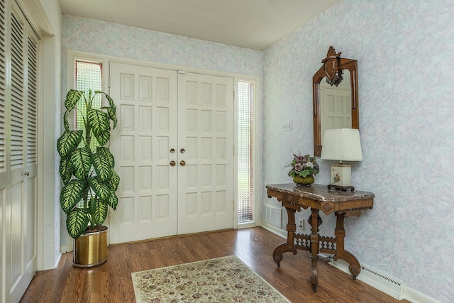 1964 Shadybrook Ln, Lexington, KY 40502 - entrance foyer with wallpapered walls, wood finished floors, and baseboards