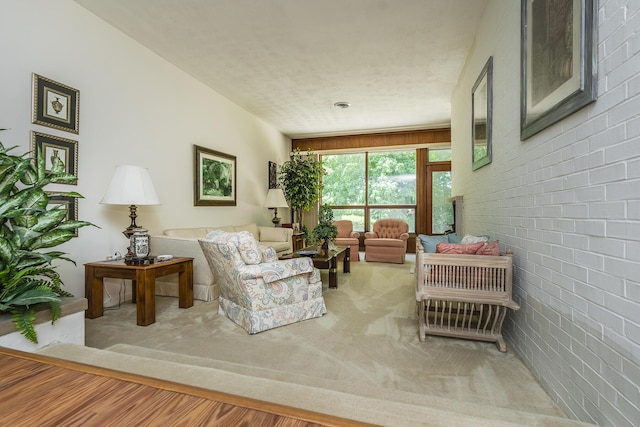 1964 Shadybrook Ln, Lexington, KY 40502 - carpeted living room featuring brick wall