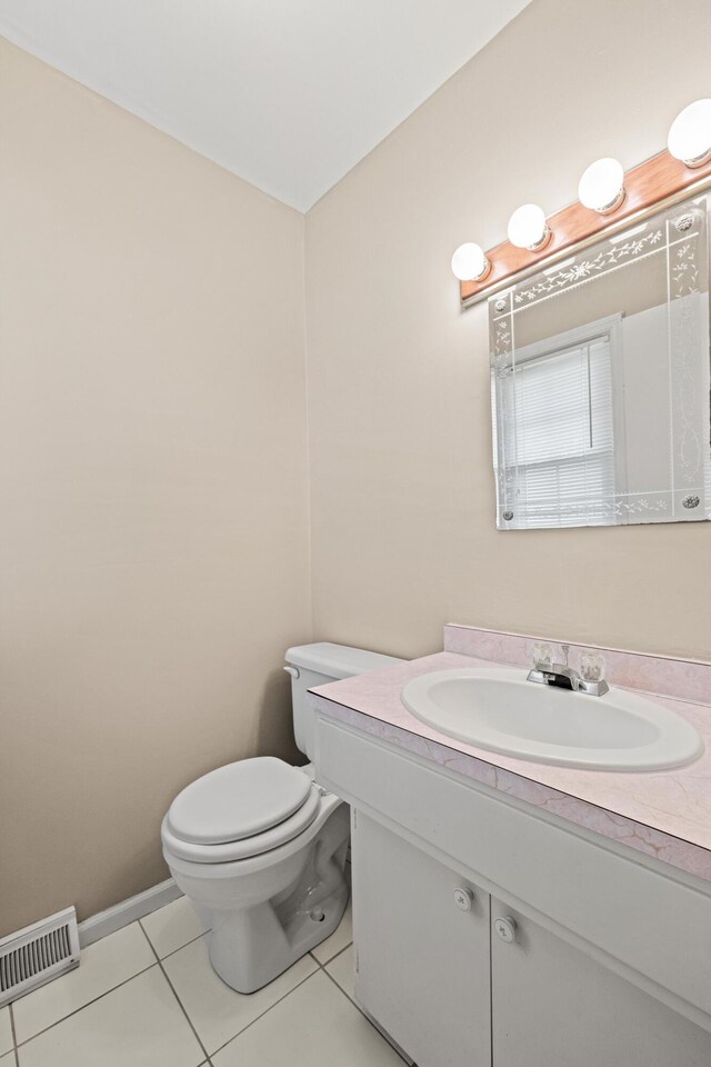 307 N Doctor St, Springfield, KY 40069 - half bath with visible vents, toilet, tile patterned flooring, and vanity