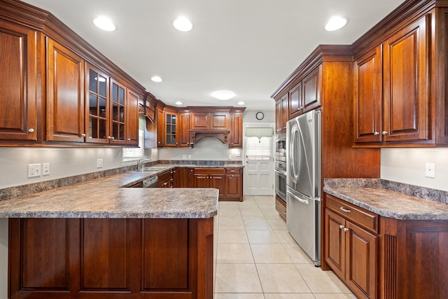 307 N Doctor St, Springfield, KY 40069 - kitchen featuring light tile patterned floors, glass insert cabinets, a sink, dark countertops, and stainless steel appliances